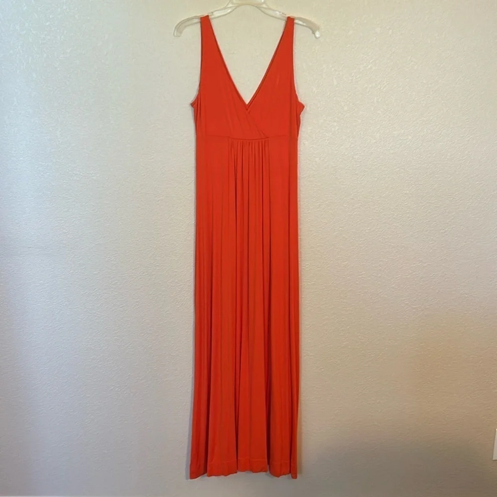 Women’s New York and Co orange maxi dress size XS.